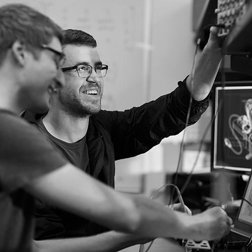 two engineering students working on a project